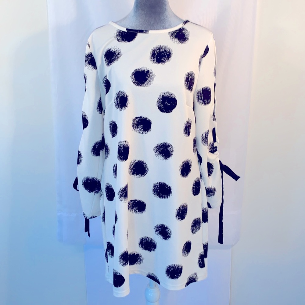 Aryeh dress size XL white with circular black designs throughout dress.